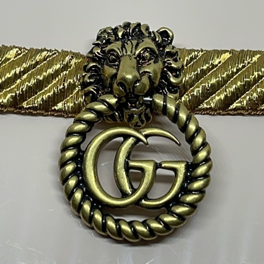 Gucci Gold Tone Lion Head GG Bracelet Charm